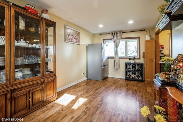 interior space with hardwood / wood-style floors