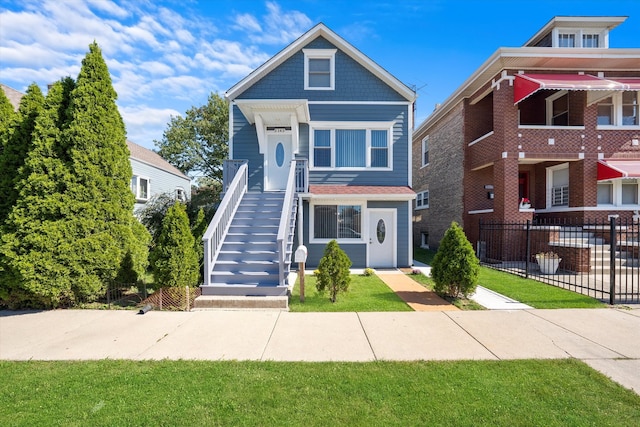 view of front of home featuring a front lawn