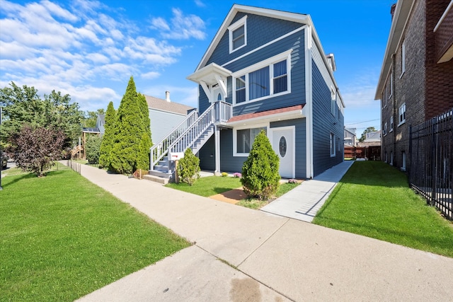 view of front of home with a front yard