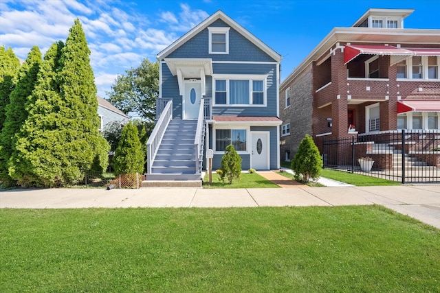 view of front facade featuring a front yard