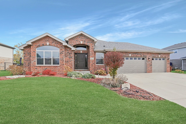 ranch-style house with a front yard and a garage