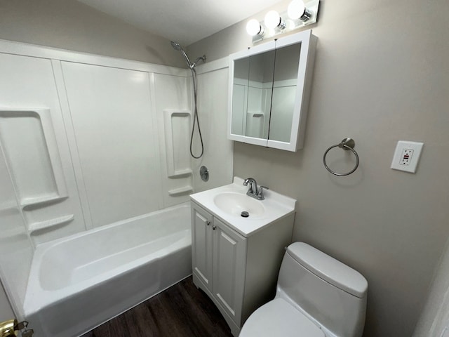 full bathroom featuring shower / bath combination, hardwood / wood-style flooring, vanity, and toilet