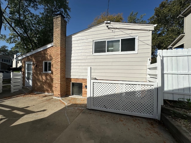 back of house featuring a patio