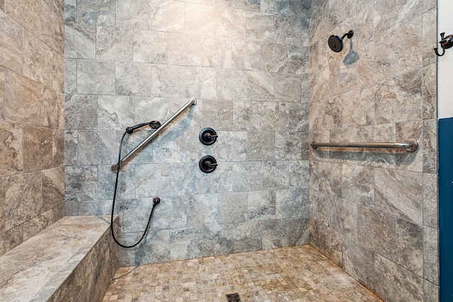 bathroom featuring tiled shower