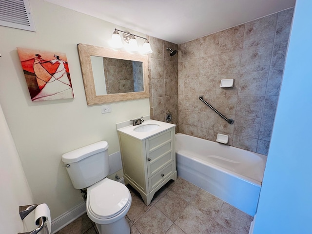 full bathroom featuring vanity, toilet, tile patterned floors, and tiled shower / bath combo