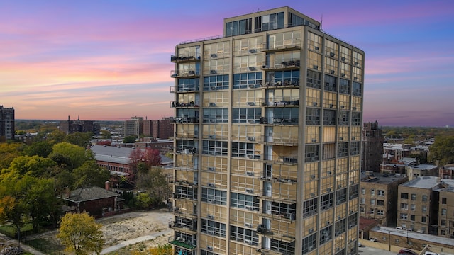 view of outdoor building at dusk