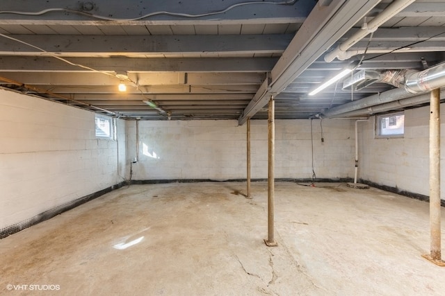 basement featuring plenty of natural light