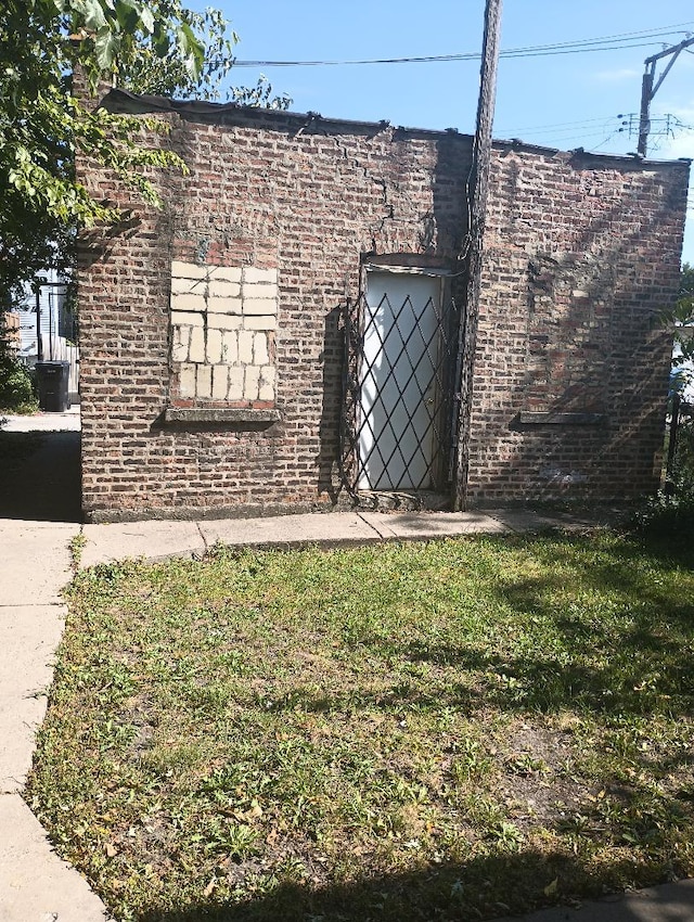 view of home's exterior featuring a lawn