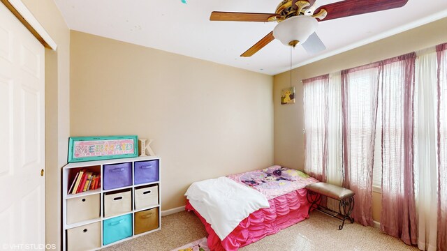 bedroom with a closet and ceiling fan