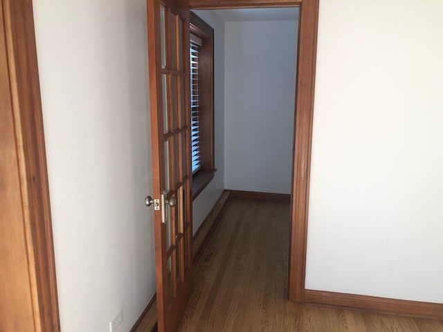 512 W Barry Ave Unit 201, Chicago, IL 60657 - hall featuring wood finished floors and baseboards