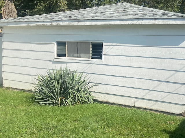 view of property exterior with a lawn