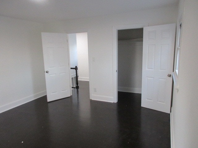 unfurnished bedroom featuring a closet