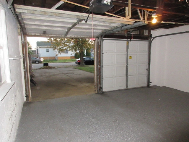 garage with a garage door opener