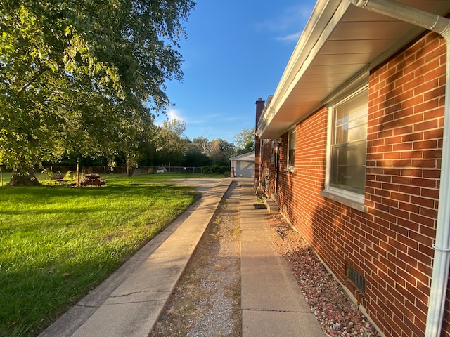 view of property exterior with a lawn