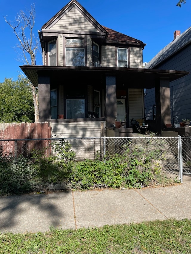 view of property with covered porch