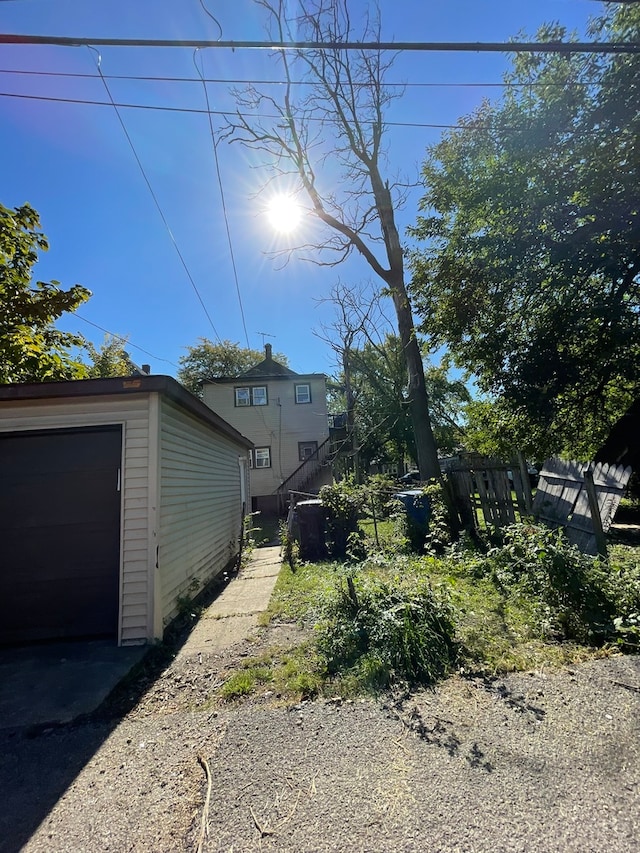 view of yard featuring a garage