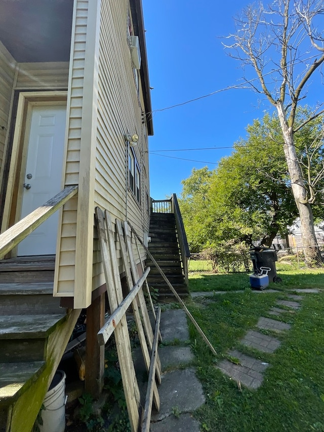 view of property exterior featuring a yard