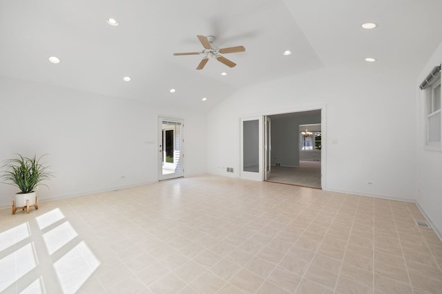 unfurnished room featuring ceiling fan and lofted ceiling