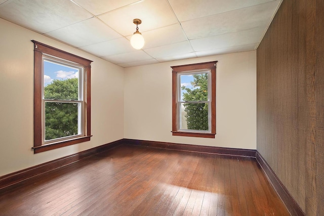 26811 S Kankakee St, Manhattan, IL 60442 - empty room featuring dark wood finished floors and baseboards