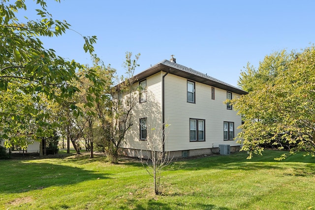 26811 S Kankakee St, Manhattan, IL 60442 - view of side of home with a yard and a chimney