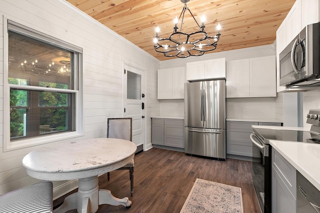 26811 S Kankakee St, Manhattan, IL 60442 - kitchen featuring appliances with stainless steel finishes, wooden ceiling, a chandelier, gray cabinets, and light countertops