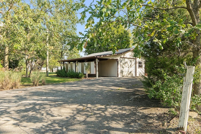 26811 S Kankakee St, Manhattan, IL 60442 - view of home's exterior featuring asphalt driveway