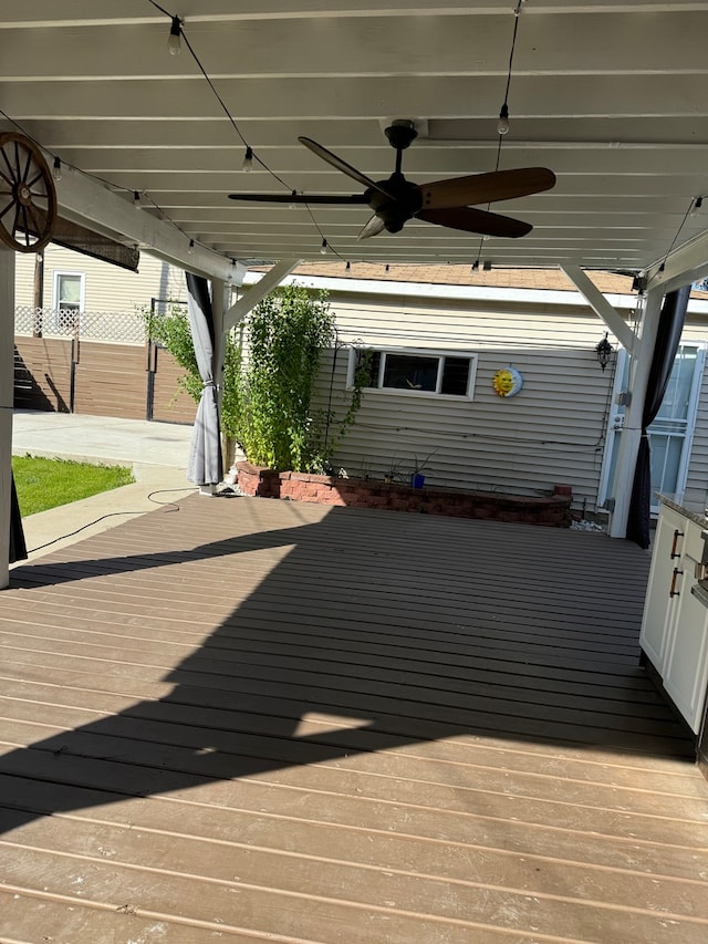 wooden terrace with ceiling fan