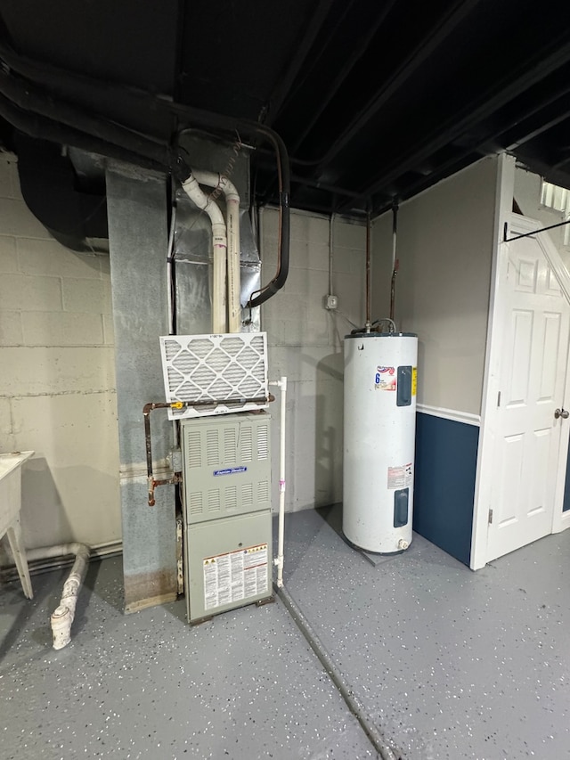 utility room featuring water heater