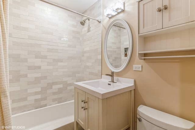 full bathroom with shower / bath combination with curtain, toilet, and vanity