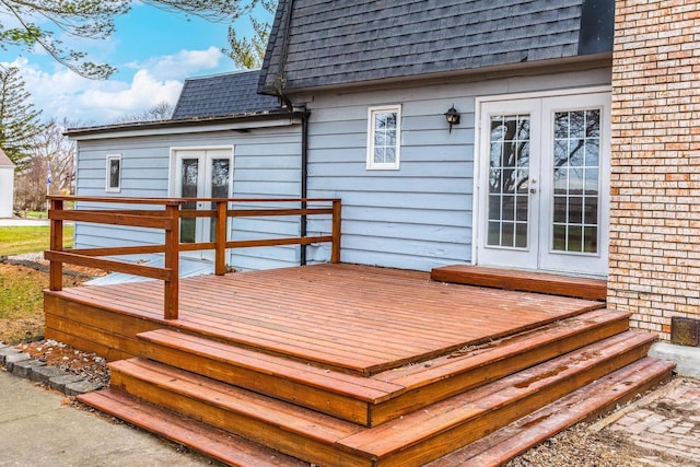 wooden deck featuring french doors