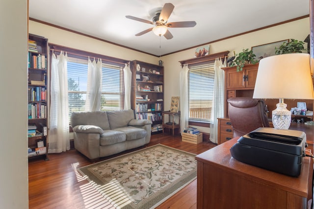 office featuring crown molding, dark wood-type flooring, and ceiling fan