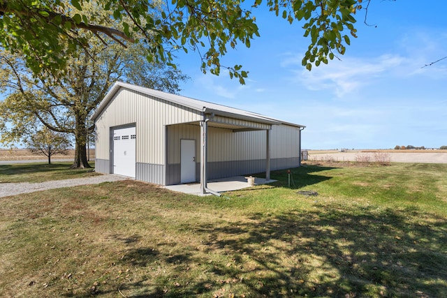 garage with a lawn