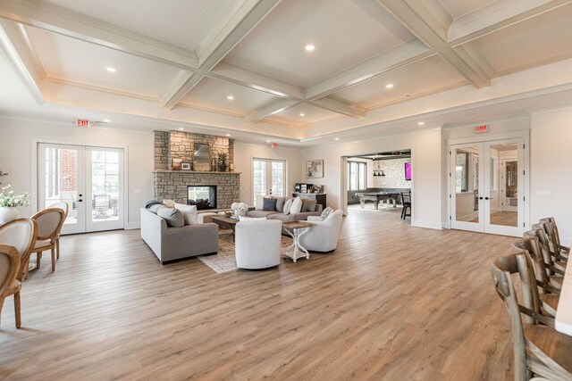 506 Stearn Dr Unit 506, Genoa, IL 60135 - living area featuring french doors, light wood-type flooring, coffered ceiling, beam ceiling, and recessed lighting