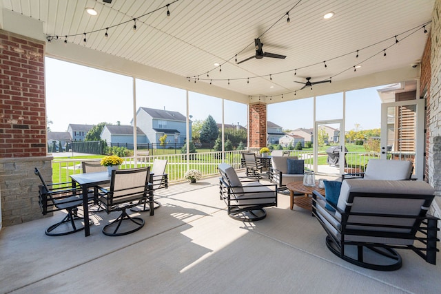 view of patio featuring outdoor lounge area and ceiling fan