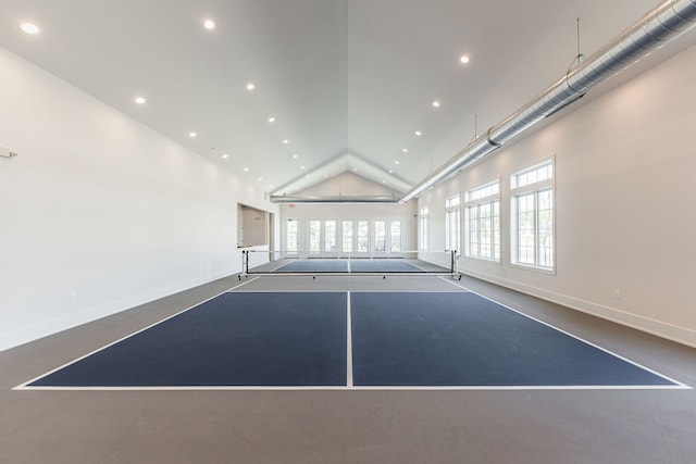 game room with vaulted ceiling