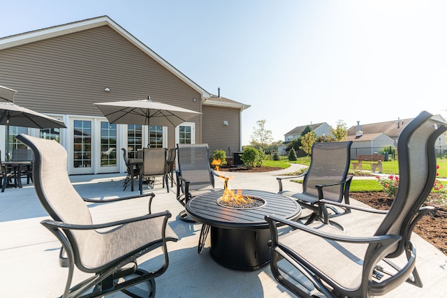 view of patio / terrace featuring an outdoor fire pit