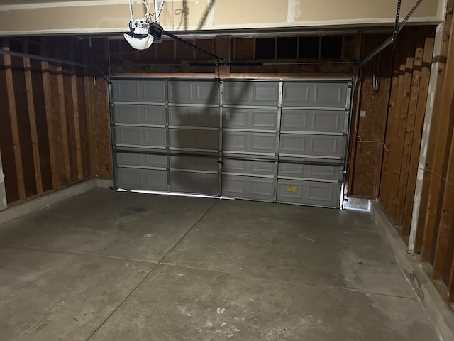 garage featuring a garage door opener