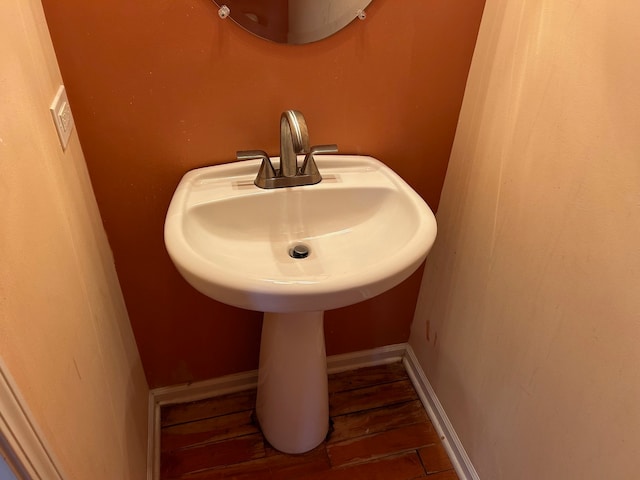 bathroom featuring wood-type flooring