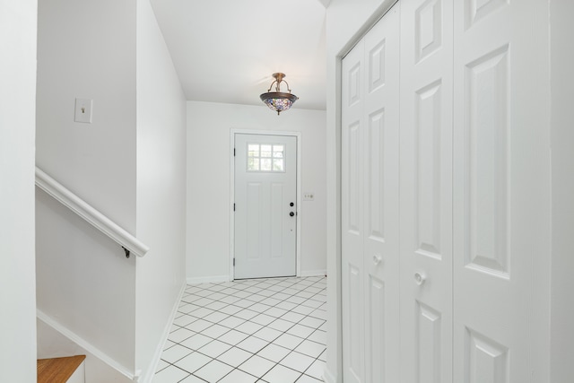 entrance foyer with light tile patterned floors