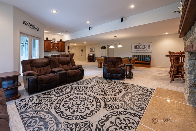 carpeted living room with a fireplace