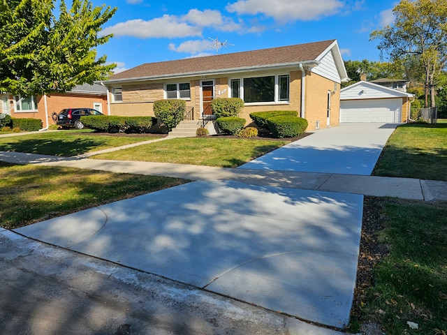 ranch-style house featuring a garage and a front lawn