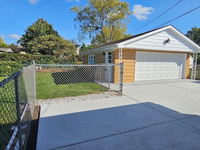 single story home with a front lawn and a garage