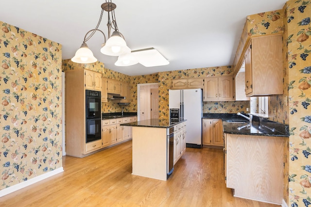 kitchen featuring double oven, sink, light hardwood / wood-style flooring, a center island, and white fridge with ice dispenser