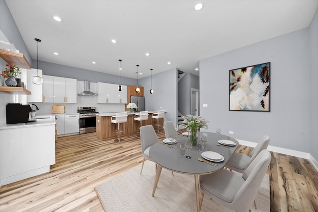 dining area featuring light hardwood / wood-style flooring