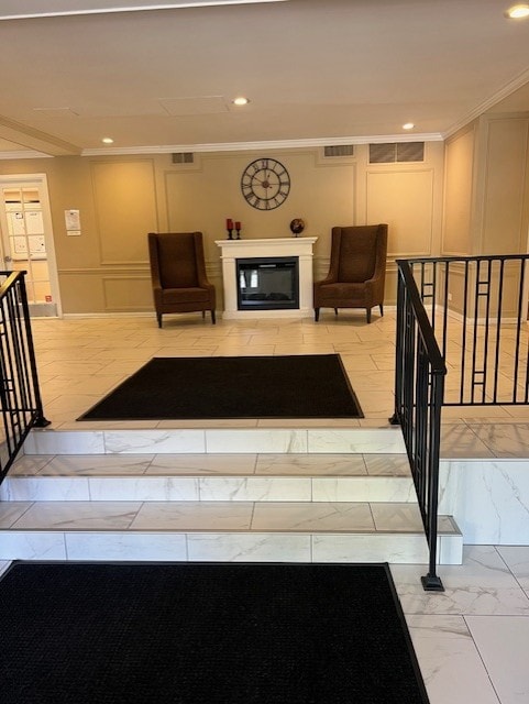 living room featuring ornamental molding