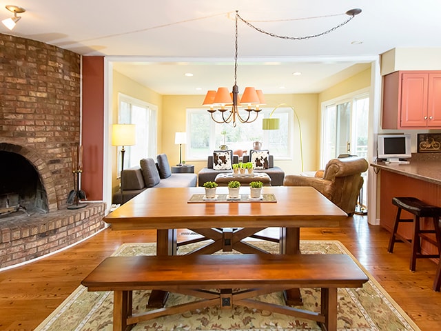 dining area with an inviting chandelier, hardwood / wood-style flooring, and plenty of natural light