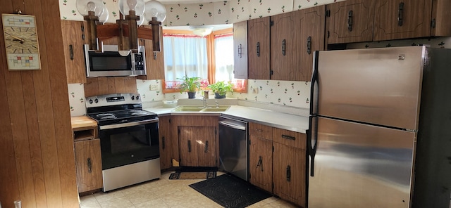 kitchen featuring appliances with stainless steel finishes and sink