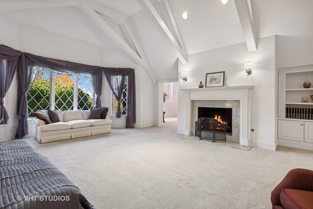 living room featuring beamed ceiling, high vaulted ceiling, and light colored carpet