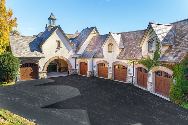 view of french country inspired facade