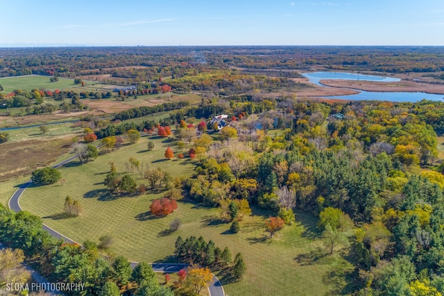 aerial view featuring a rural view and a water view